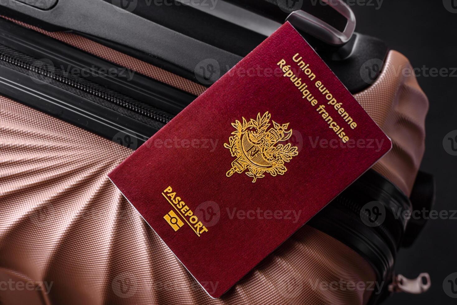 International passport of a French citizen on a suitcase photo