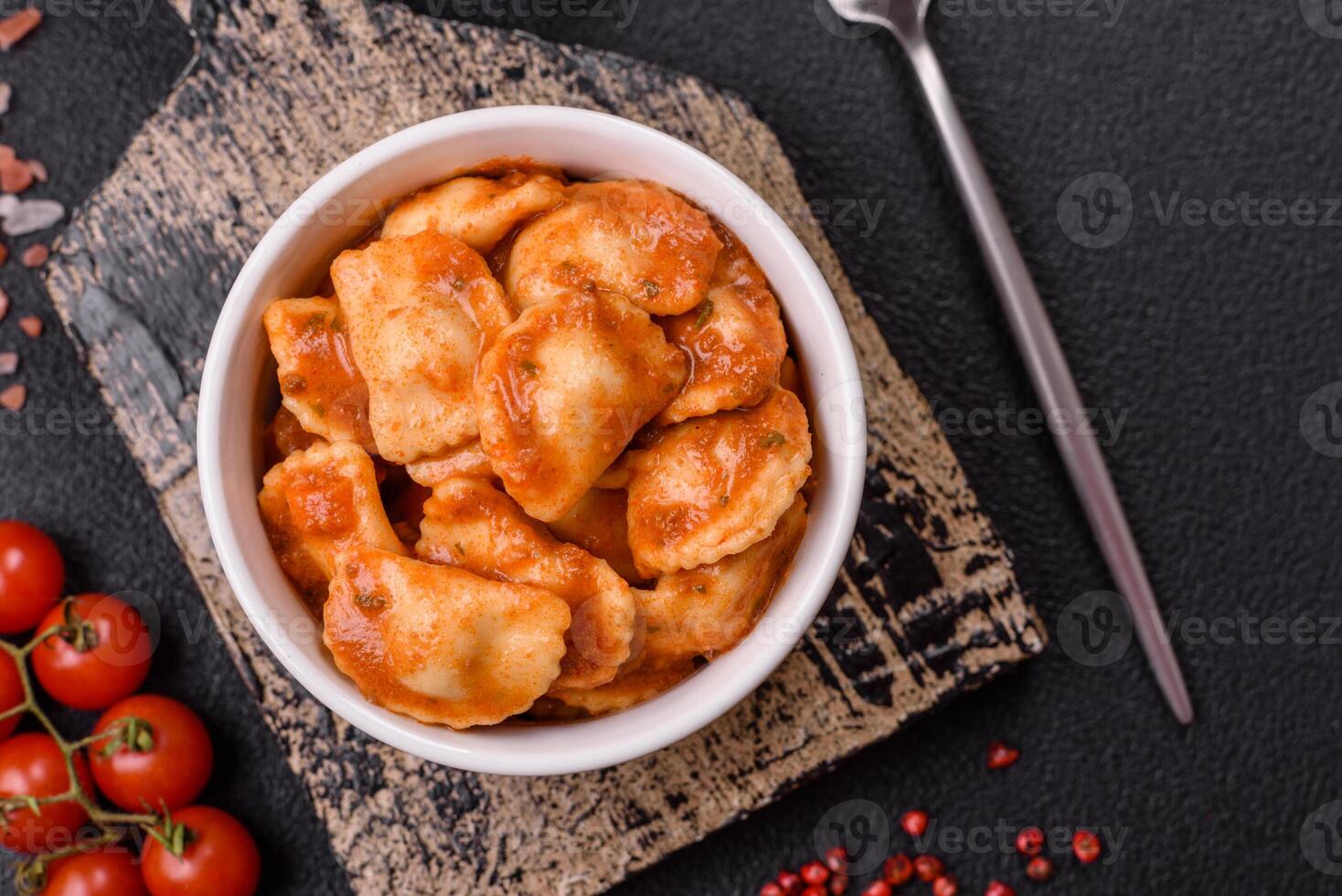 Ravioli with meat or vegetarian with ricotta, salt and spices photo