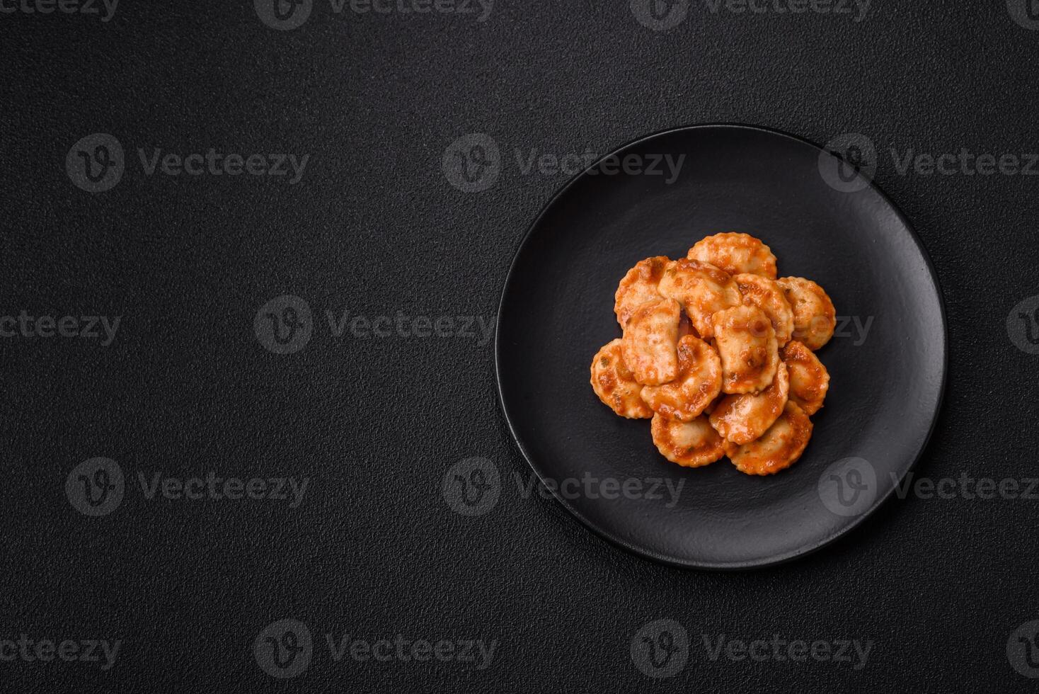 Ravioli with meat or vegetarian with ricotta, salt and spices photo