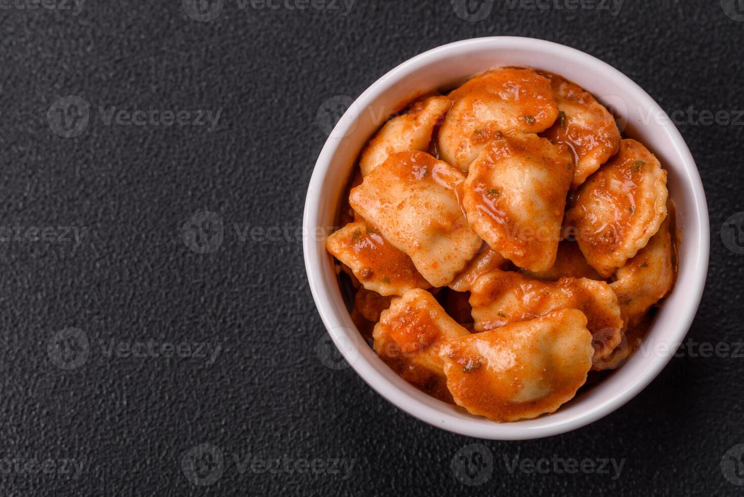 Ravioli with meat or vegetarian with ricotta, salt and spices photo