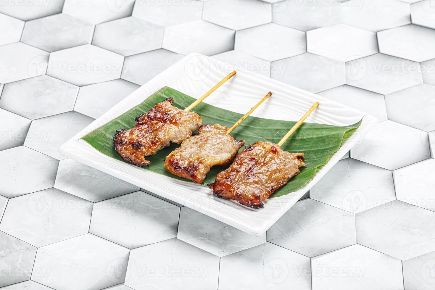 Thai cuisine - grilled pork skewer photo