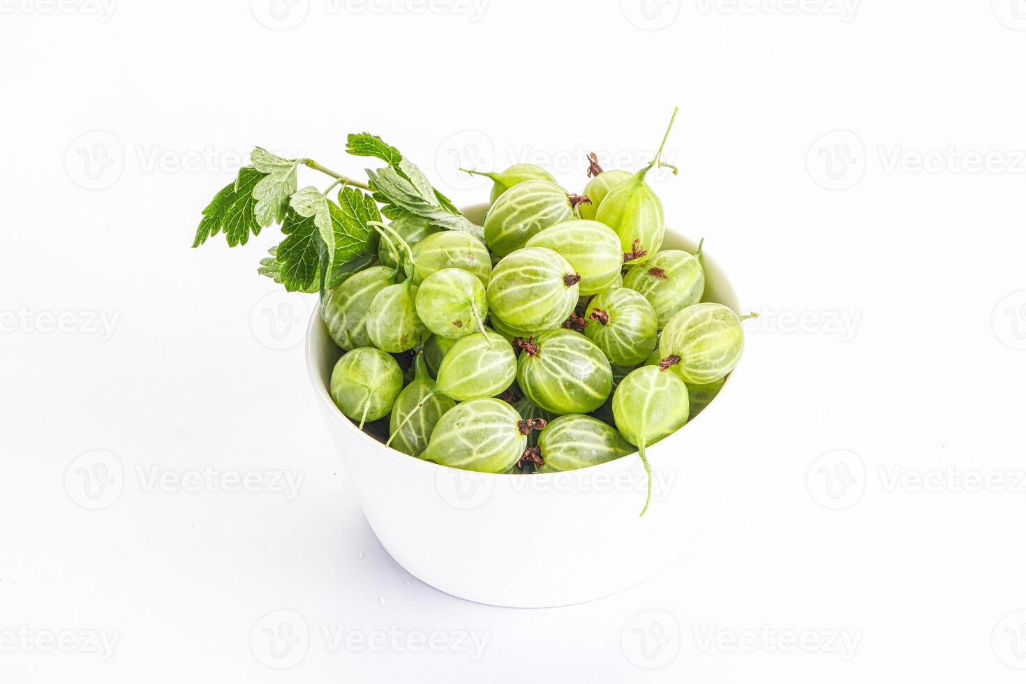 Sweet ripe gooseberries in the bowl photo
