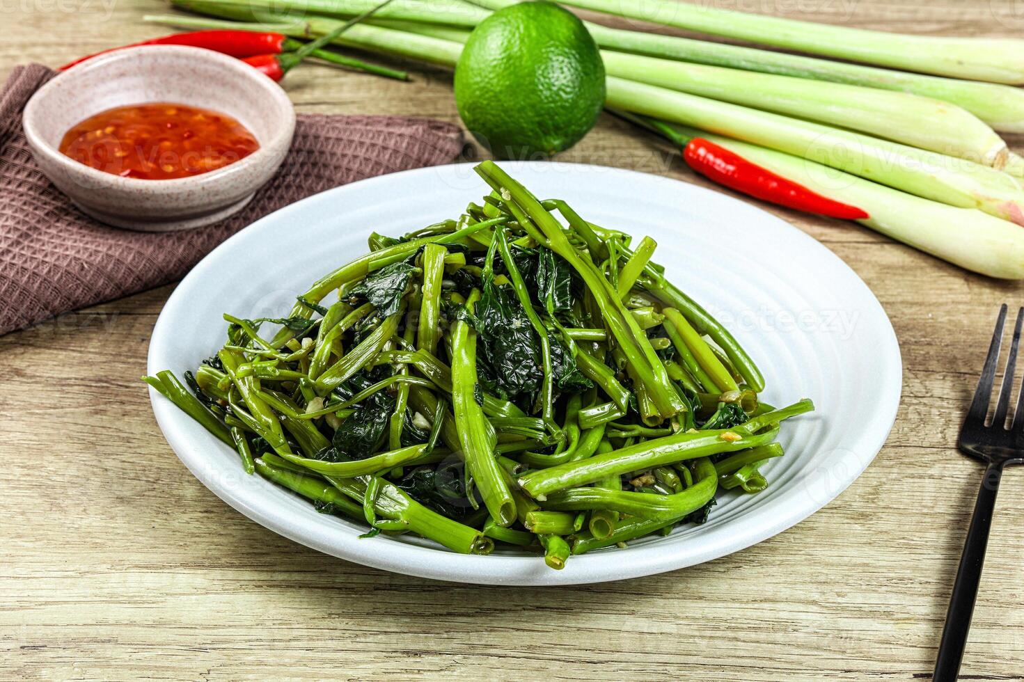 Asian cuisine stir fried morning glory photo