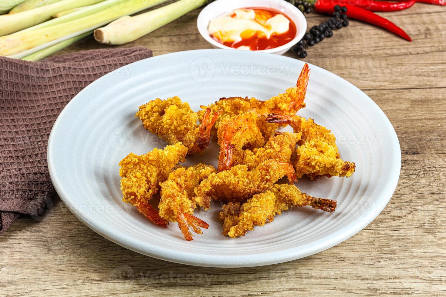 Golden deep prawn tempura wuth sauce photo