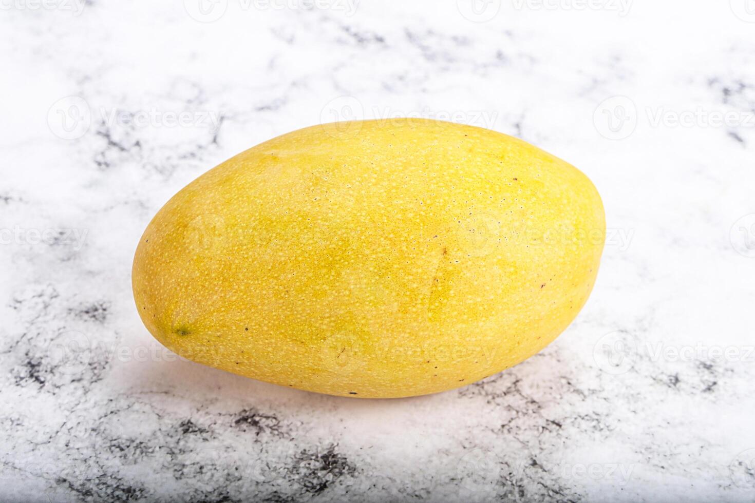 Sweet ripe juicy tropical mango fruit photo
