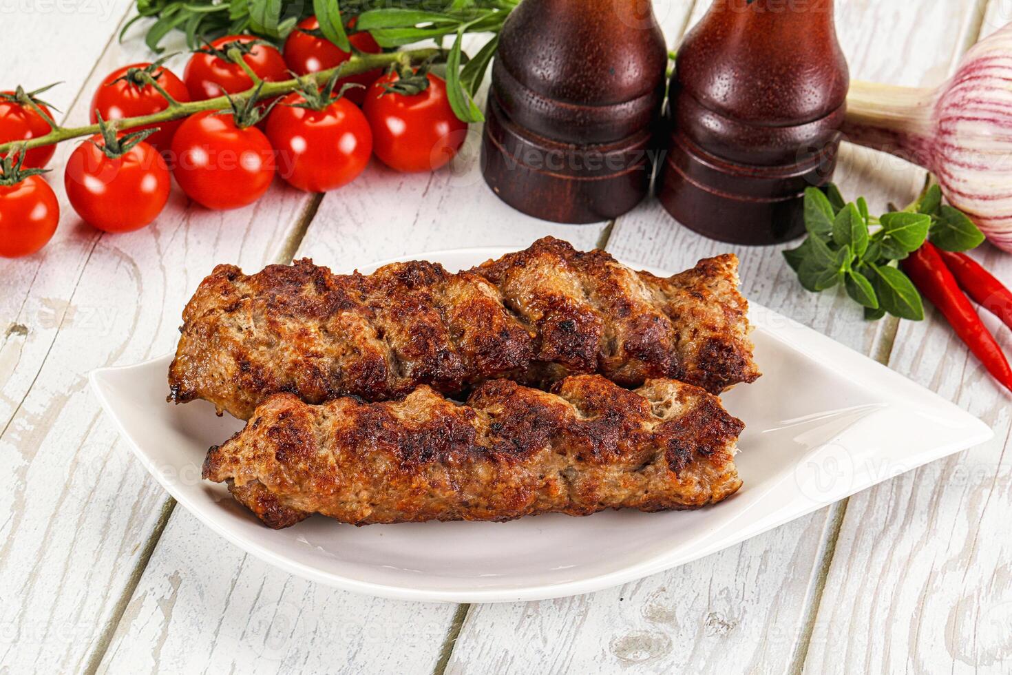 Chicken kebab minced meat and spices photo