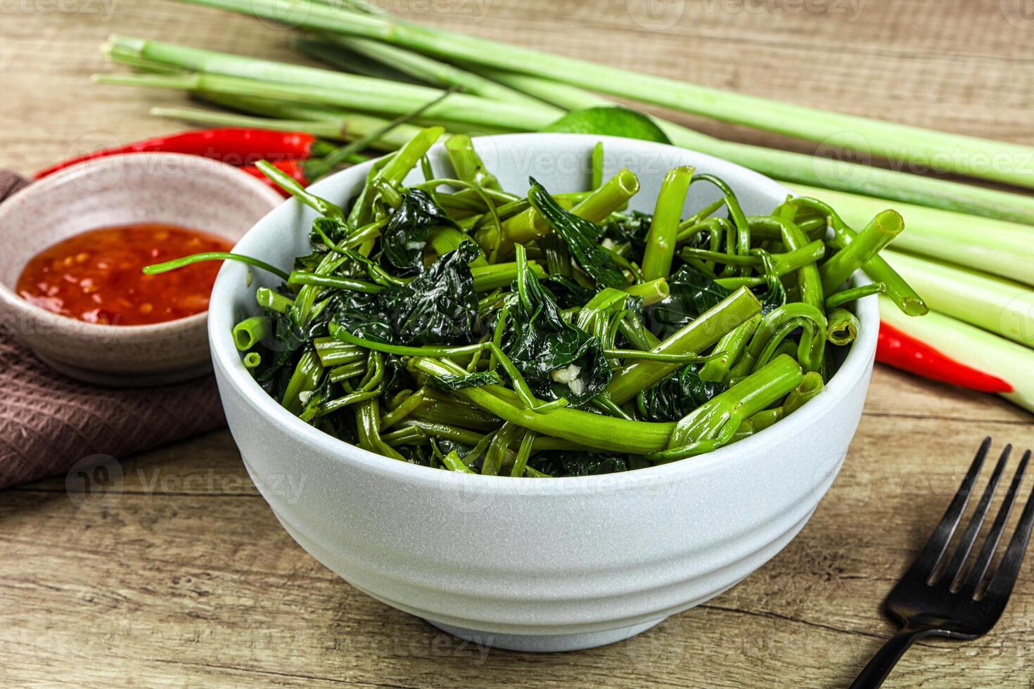 Asian cuisine stir fried morning glory photo