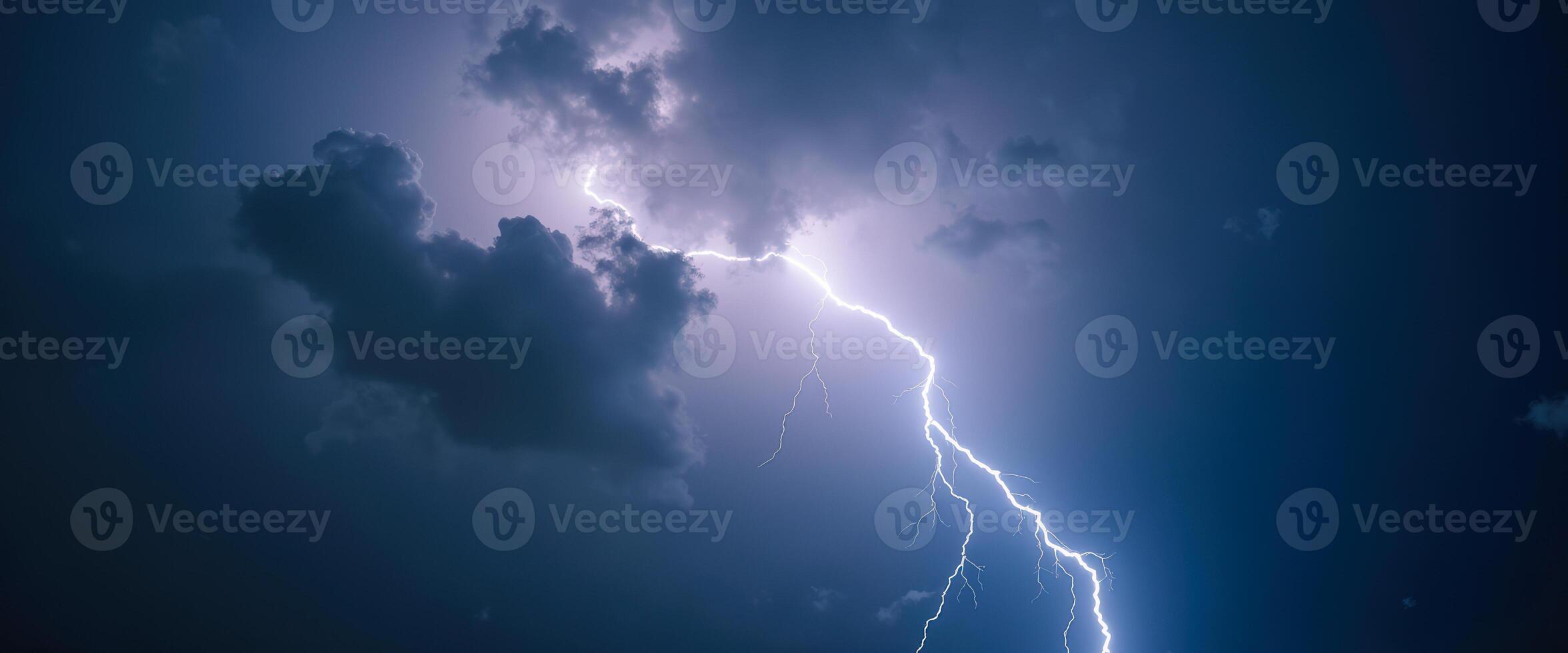 Lightning Strike in a Cloudy Sky photo