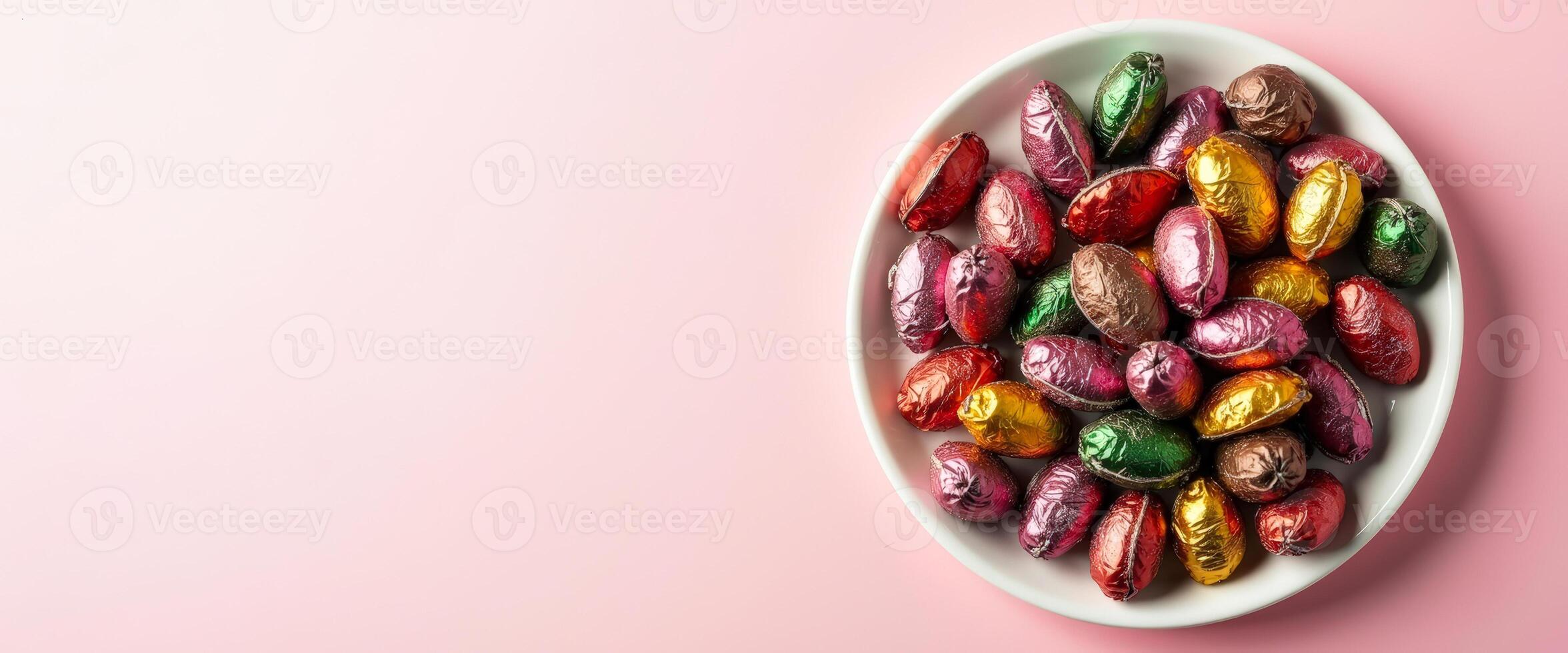 Colorful Chocolate Eggs on a White Plate photo