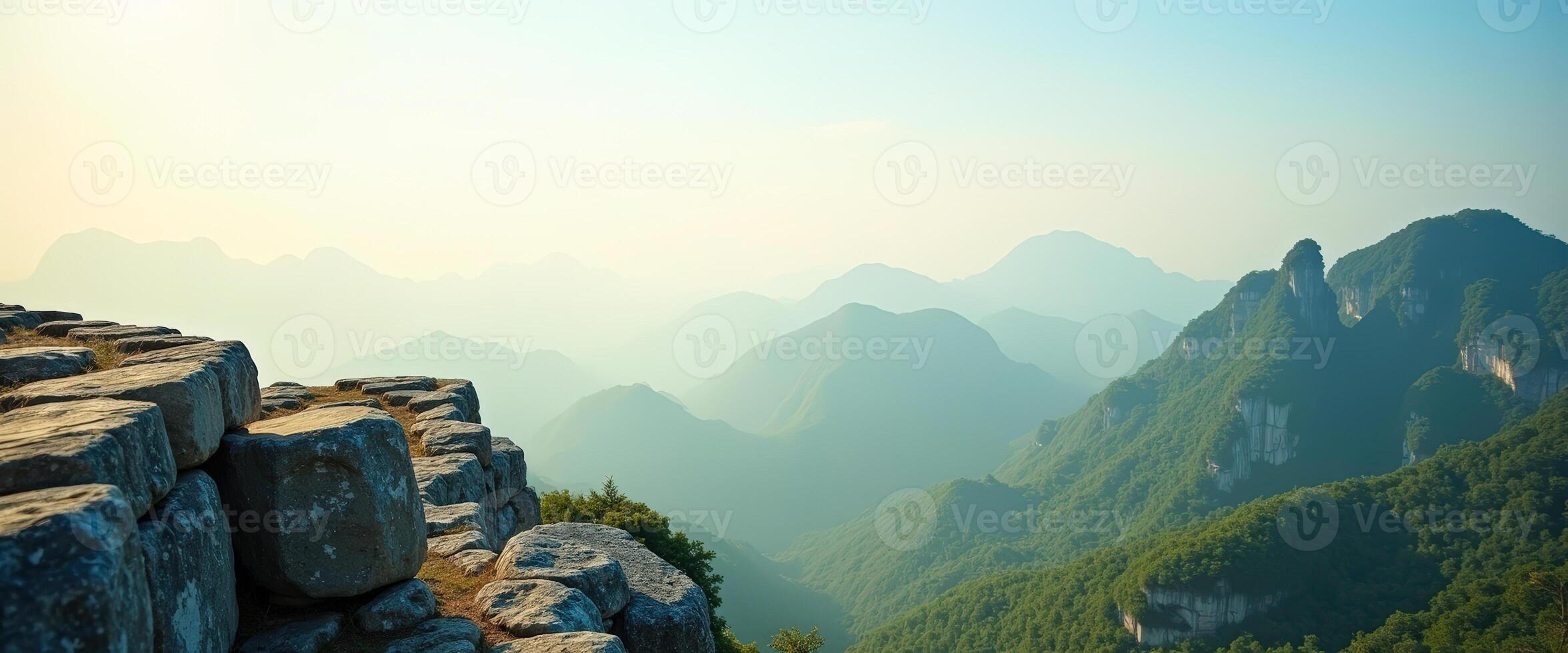 Majestic Mountain Range with Stone Pathway on the Edge of a Cliff photo