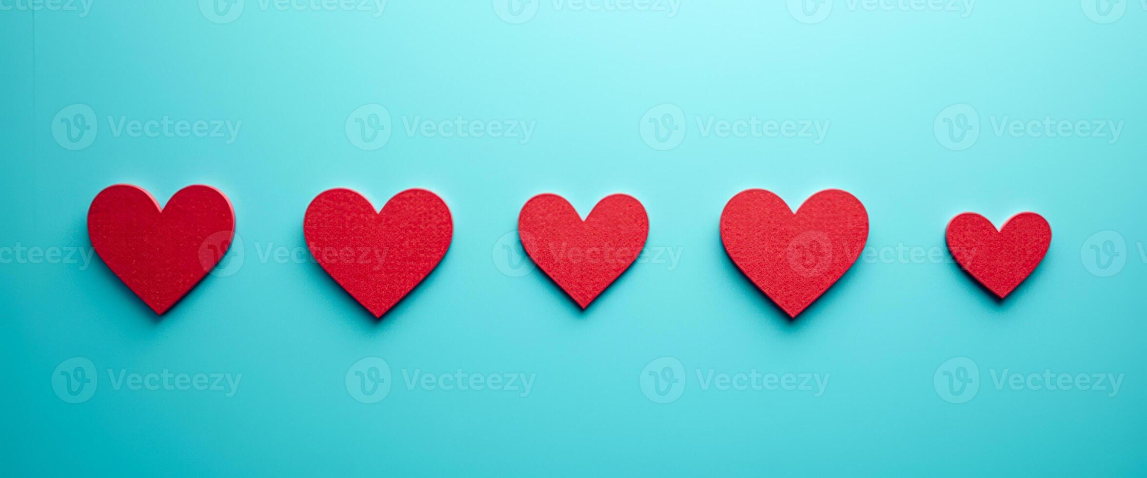 Red Hearts on Blue Background photo