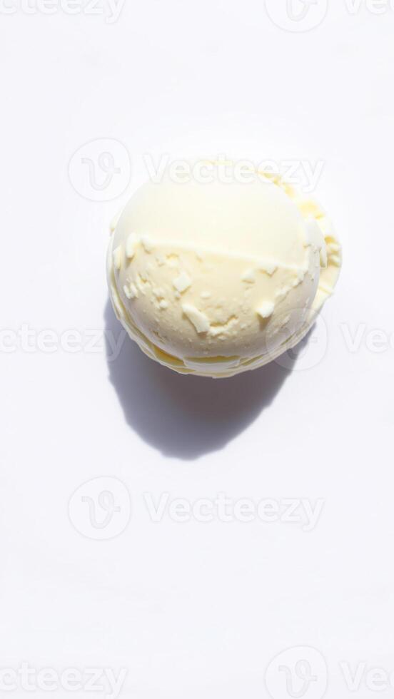 Close-up of a Single Scoop of Vanilla Ice Cream photo