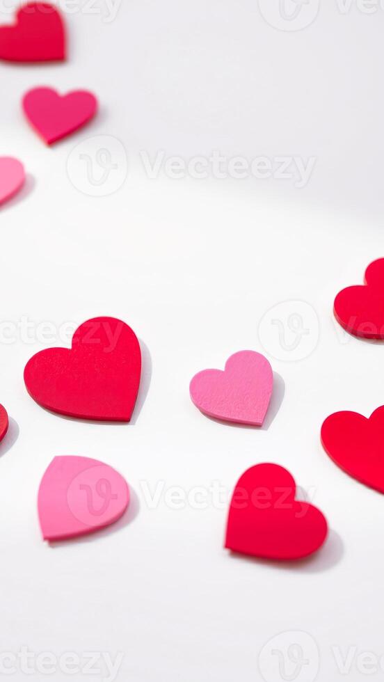 Scattered Hearts on White Background photo