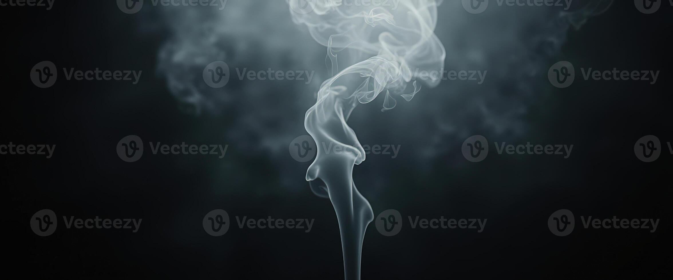 Abstract smoke pattern on black background photo
