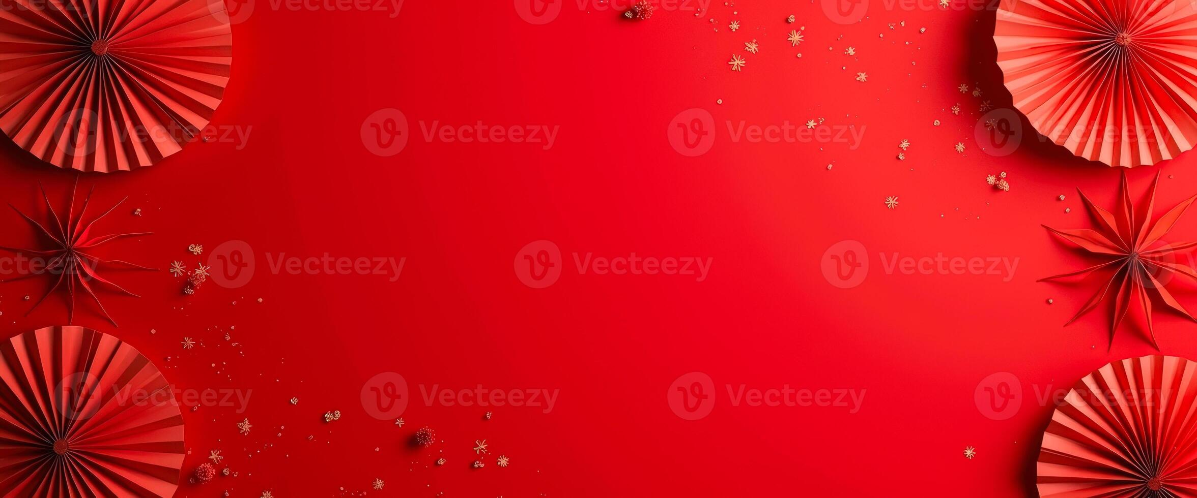 Red Paper Fans and Stars on a Red Background photo