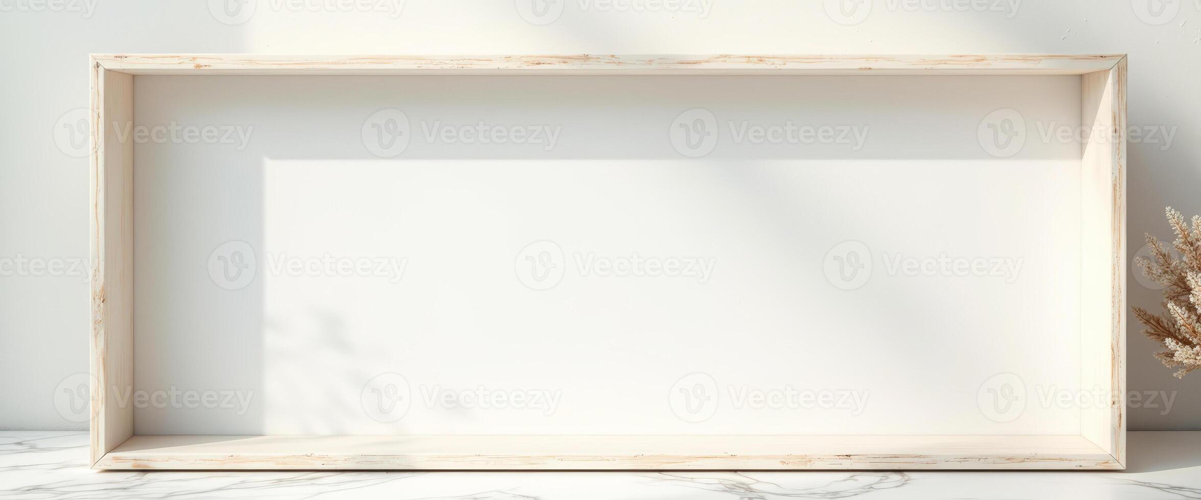 Minimalist White Wooden Frame on Marble Surface with Light photo