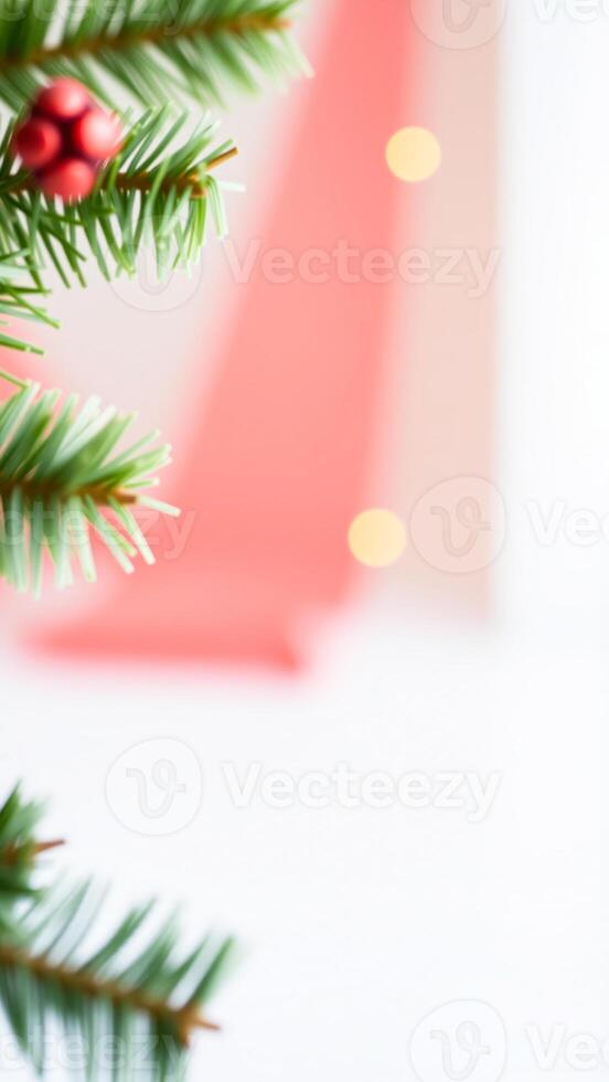 Christmas Tree Branch With Red Ornament And Bokeh Lights photo