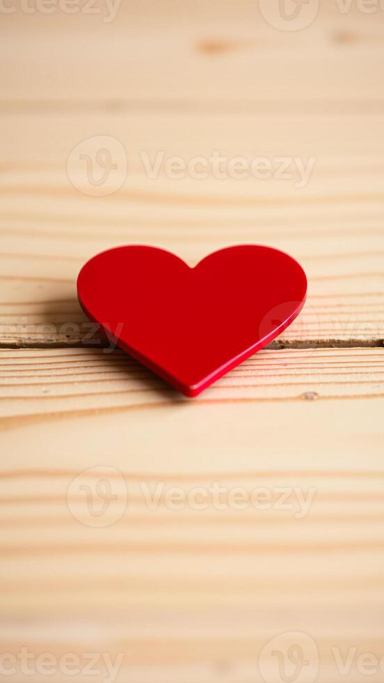Red Heart on Wooden Surface photo