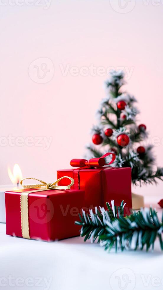 Red Gift Boxes with Christmas Tree in Background photo