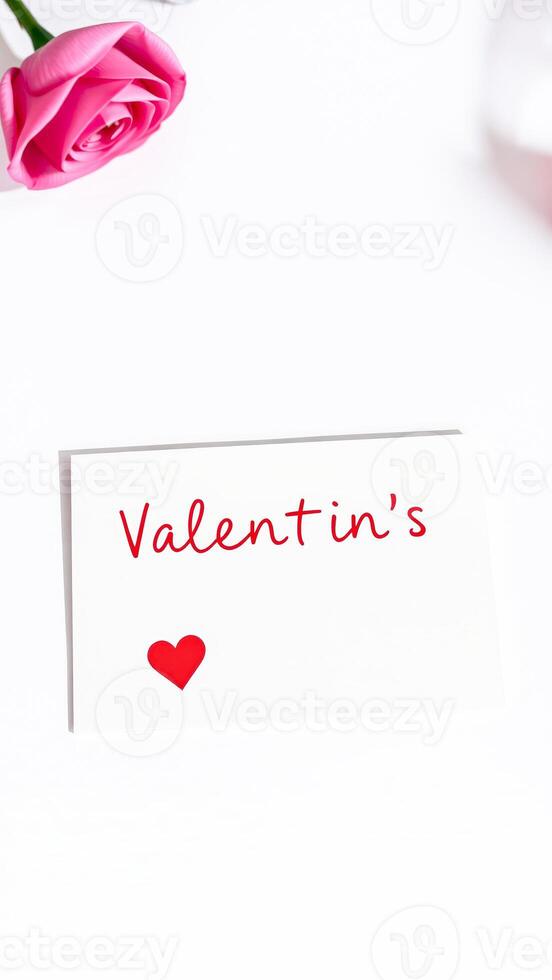 White Background With Pink Rose And Valentines Card photo