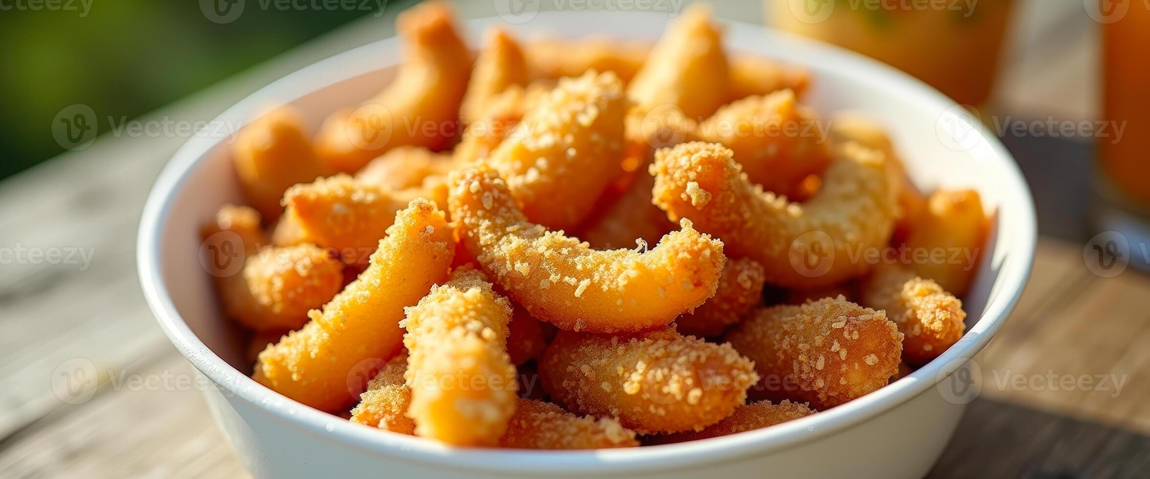 Close-up of breaded shrimp in a white bowl photo