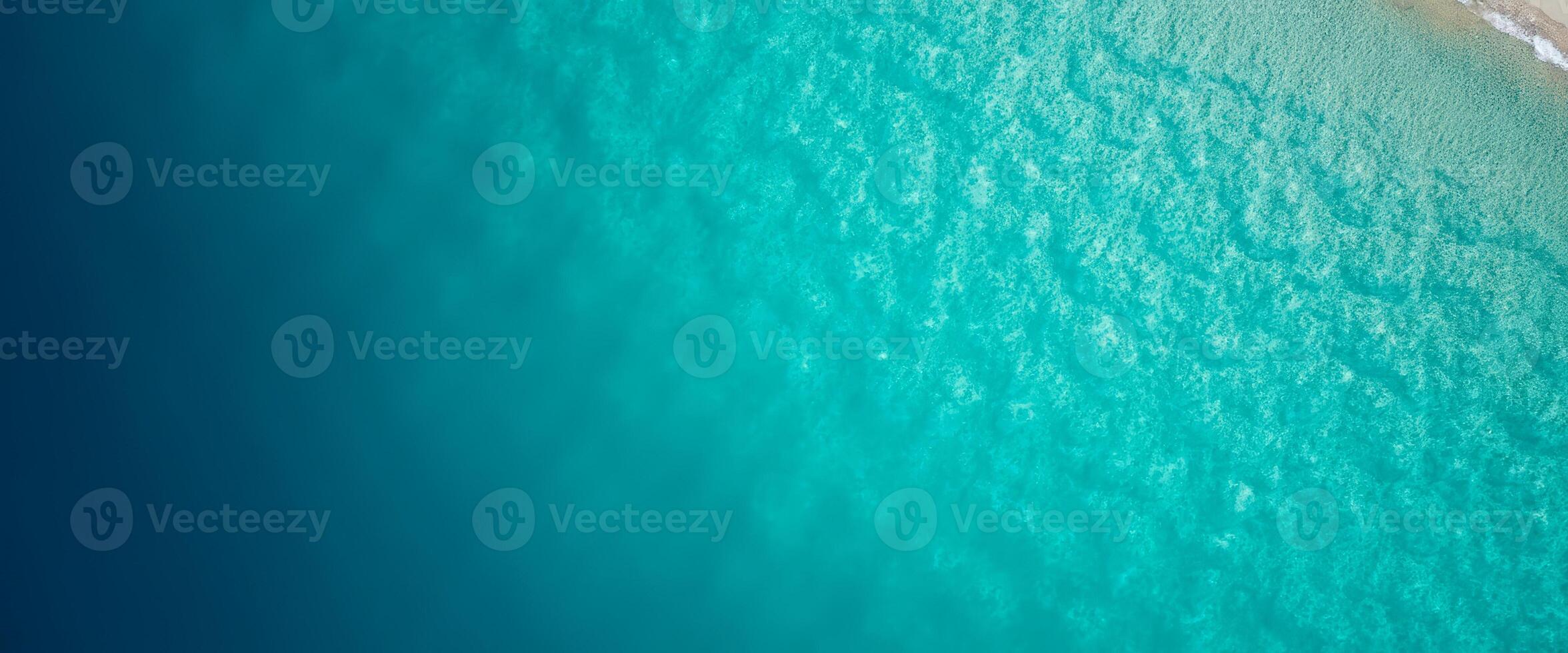 Aerial View of Turquoise Water and Sandy Beach photo