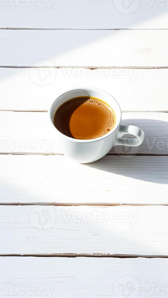 Cup of Coffee on White Wood Table photo
