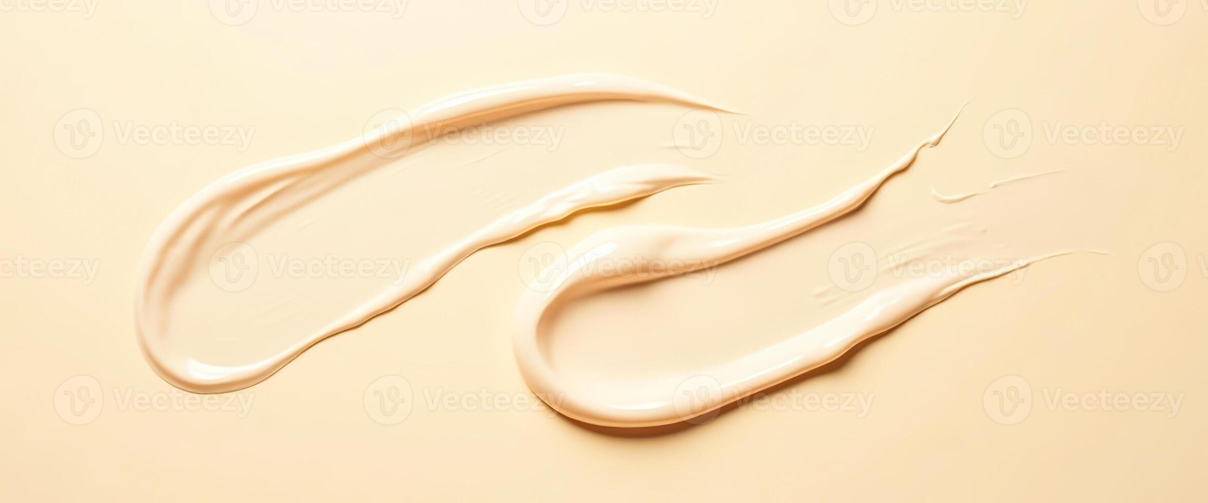 Smooth Creamy Swirls on Beige Background photo