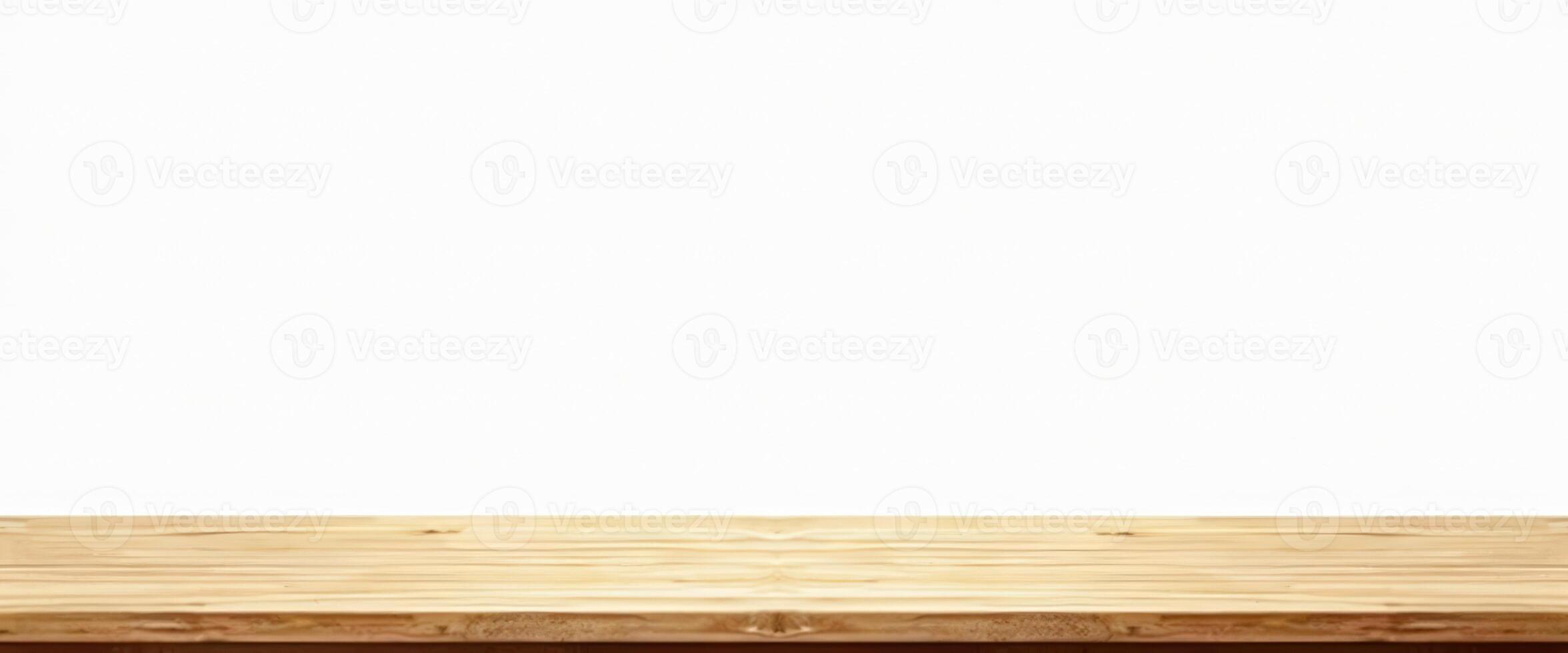 Empty wooden table isolated on white background photo