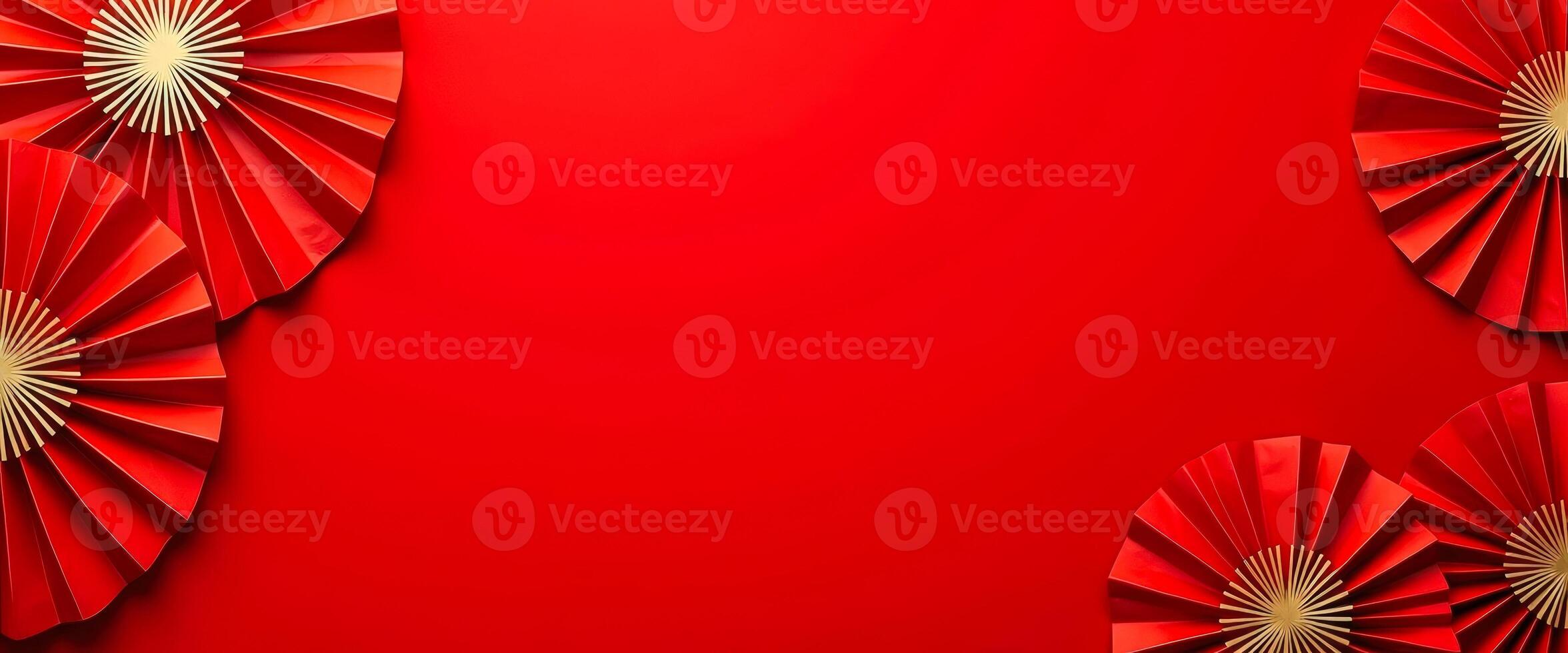 Red Paper Fans on Red Background photo