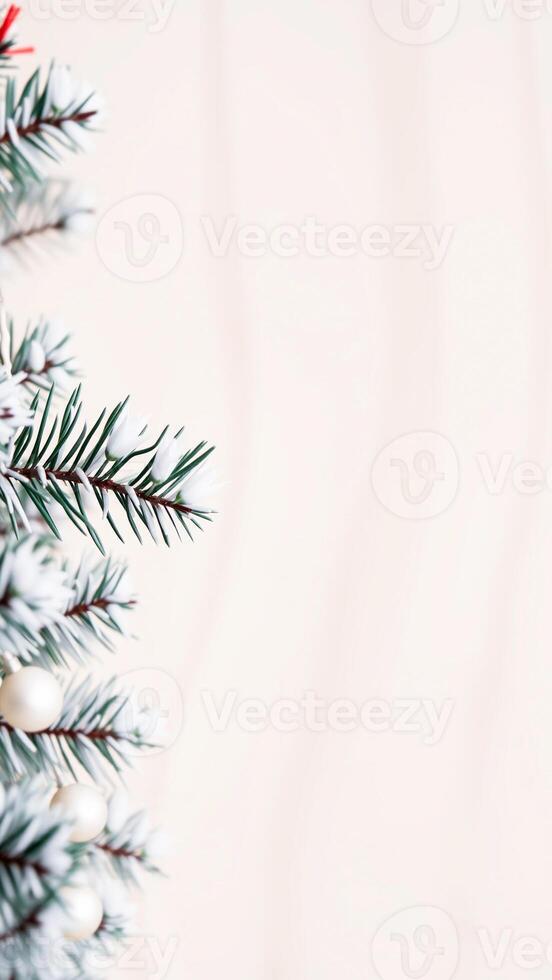 Snowy Christmas Tree Branch with White Ornaments photo