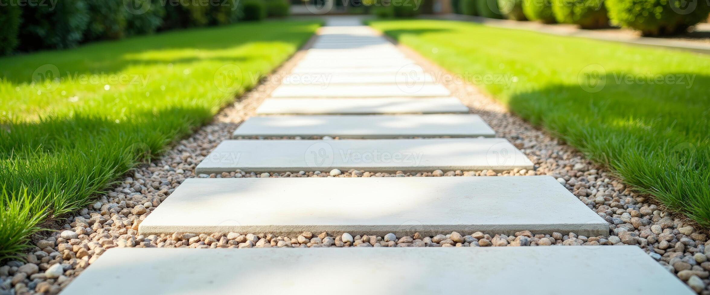 Stone Pathway Through Lush Green Lawn photo