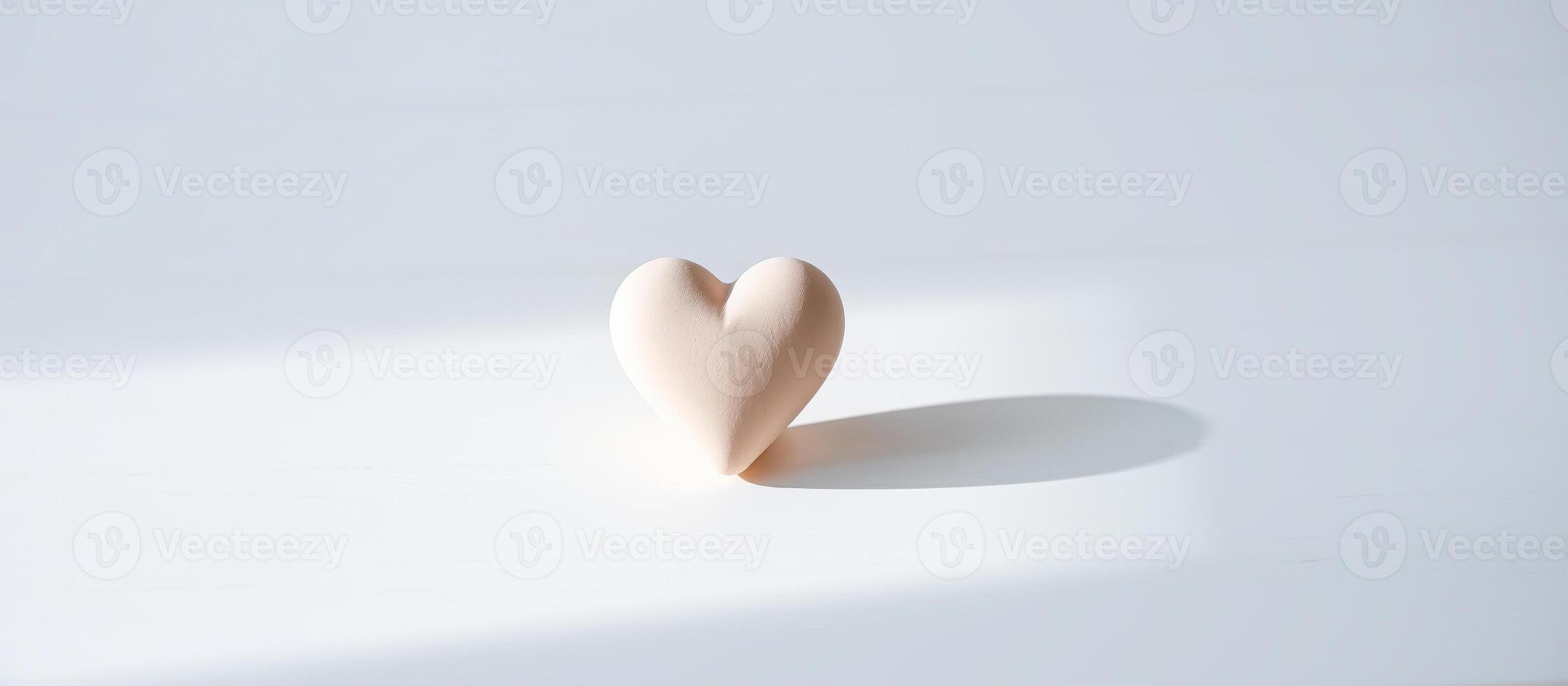 Simple Heart with Shadow on White Background photo
