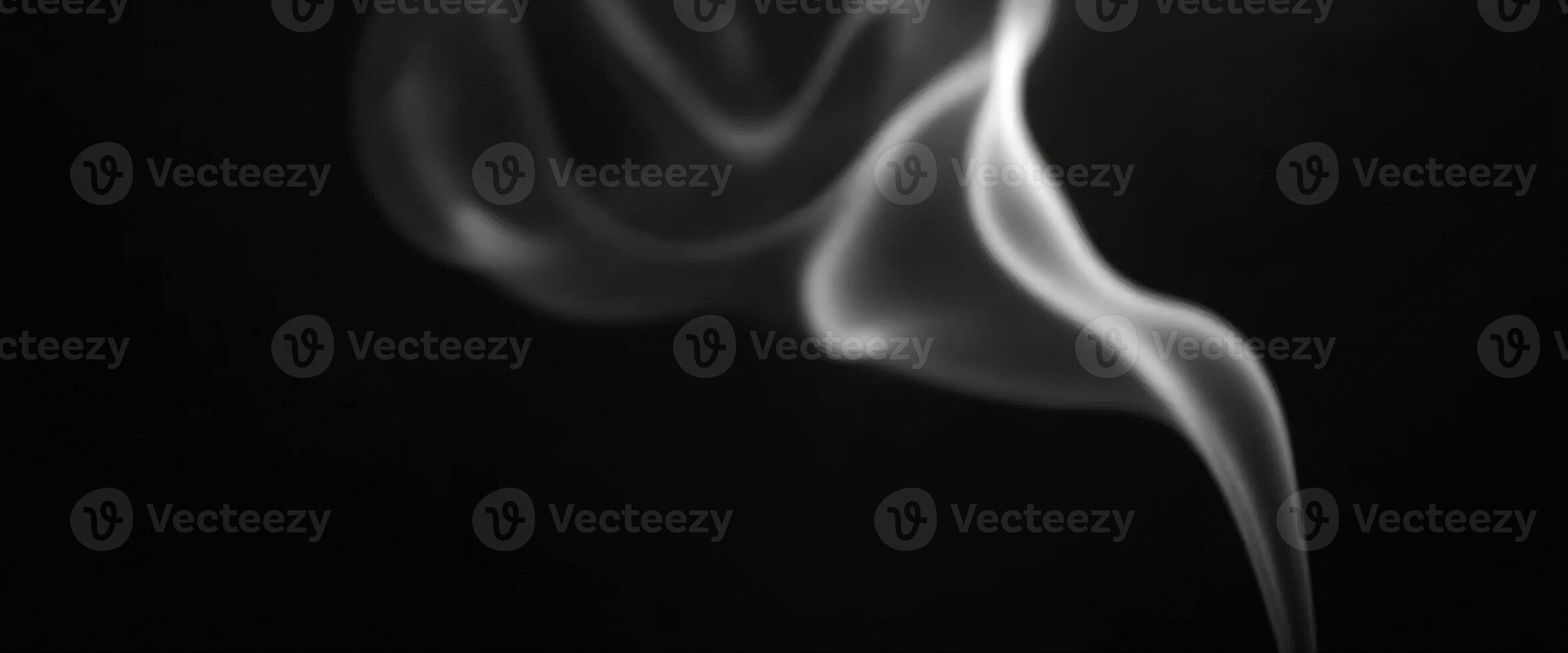 Abstract Smoke Swirls on Black Background photo