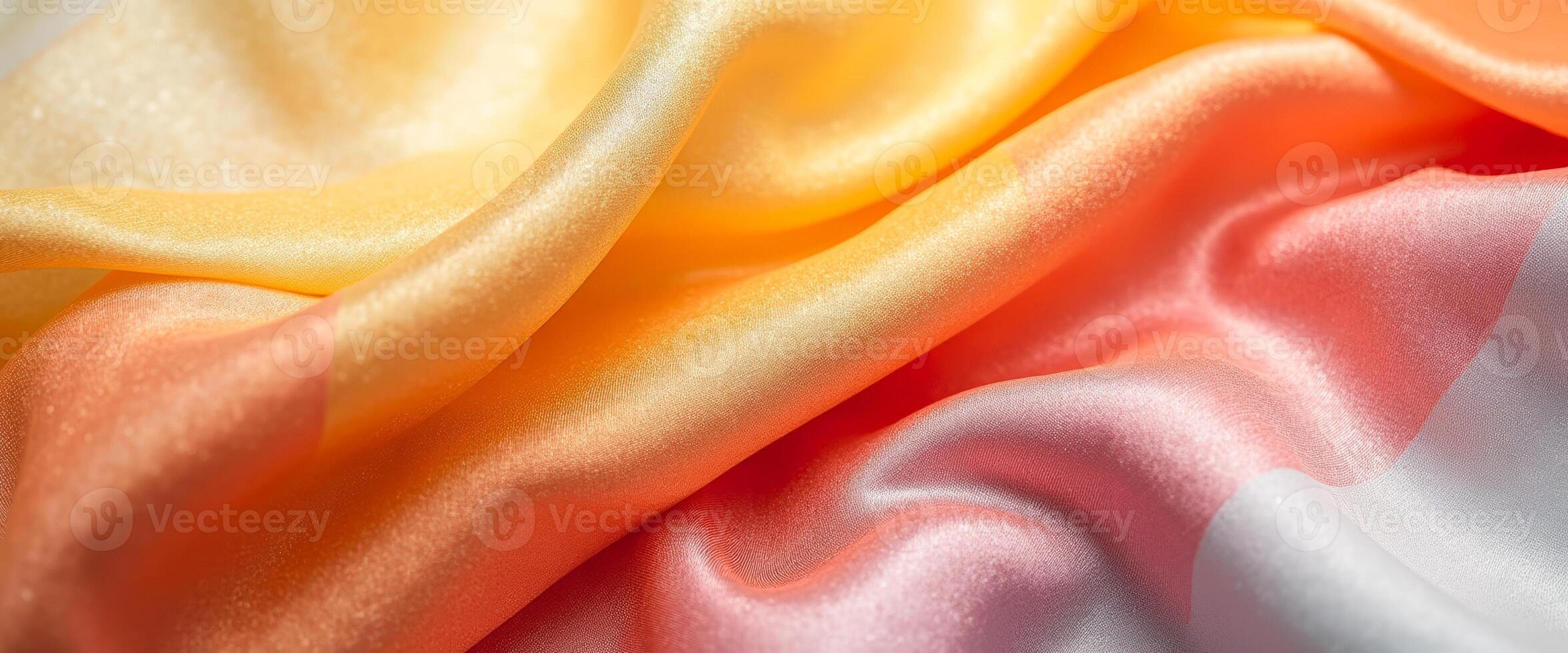 Abstract background with soft, flowing satin fabric in warm pastel colors photo