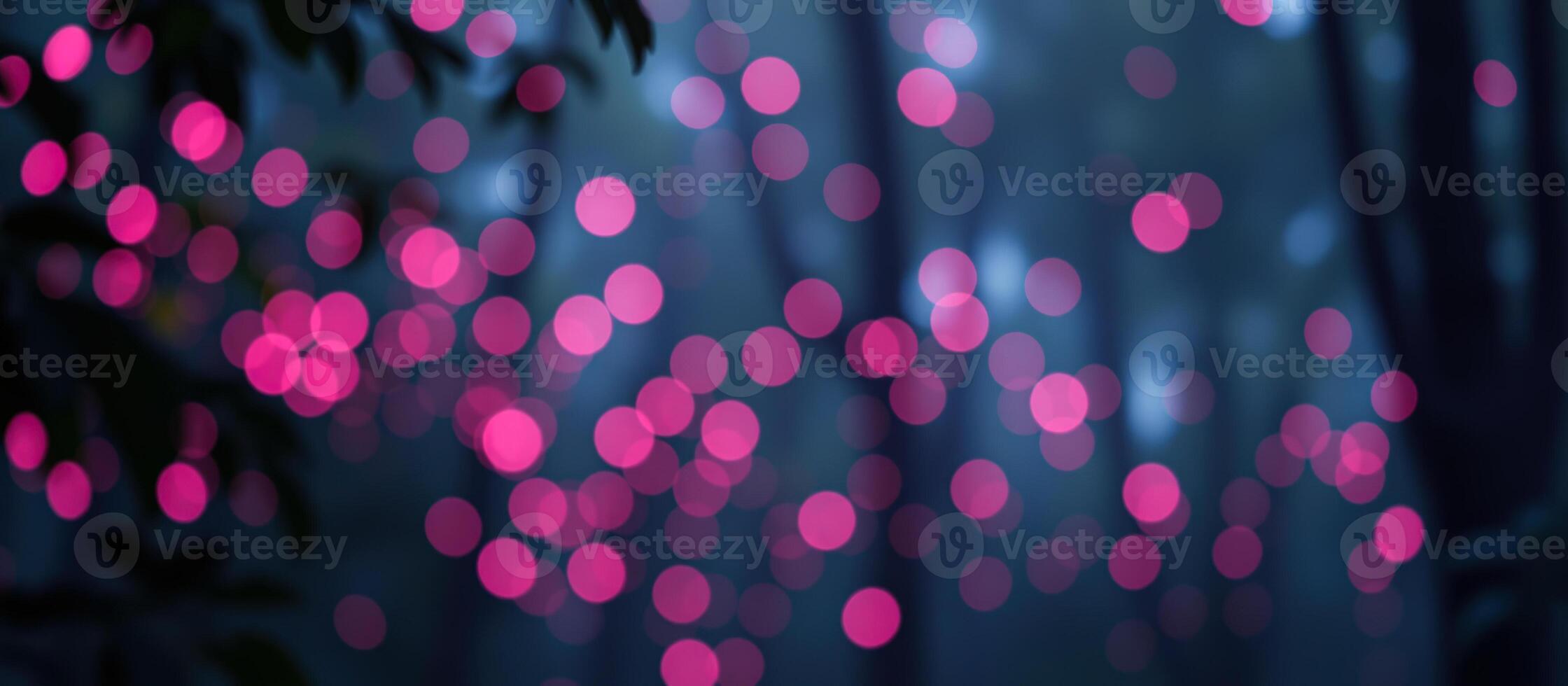 Abstract Pink Bokeh Lights in a Dark Forest photo