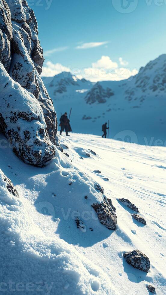Winter Mountain Landscape with Silhouettes of Hikers photo