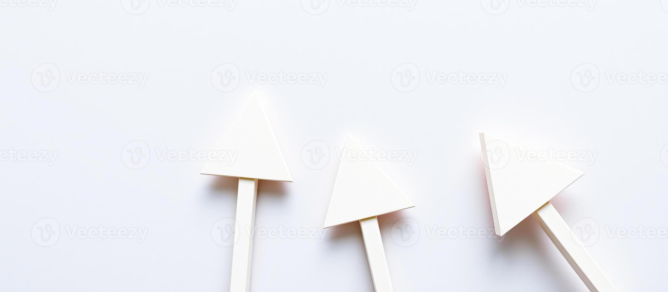 White Triangle Arrows Pointing Up on White Background photo