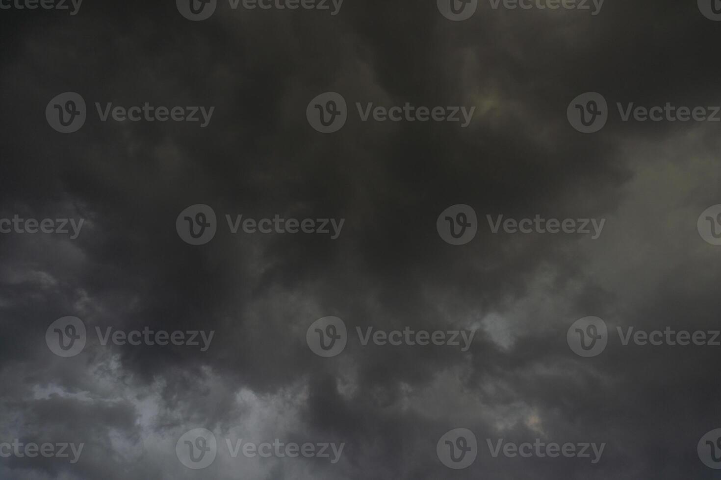 background of dark clouds during the day, with beautiful gray and rainbow colors photo