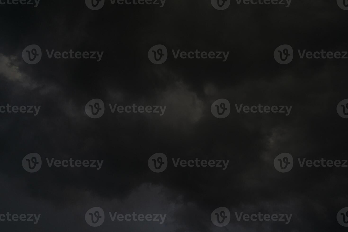 background of dark clouds during the day, with beautiful gray and rainbow colors photo