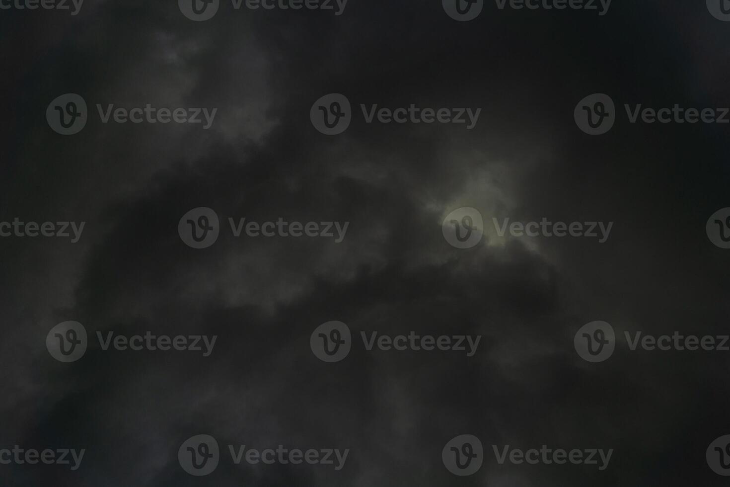 background of dark clouds during the day, with beautiful gray and rainbow colors photo