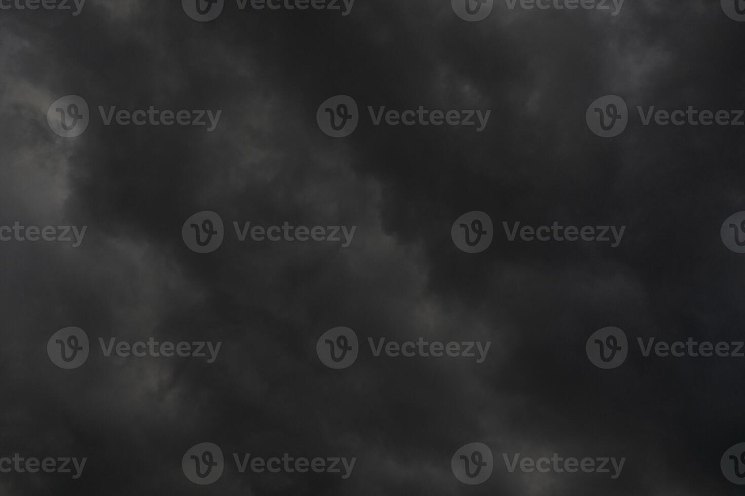 background of dark clouds during the day, with beautiful gray and rainbow colors photo