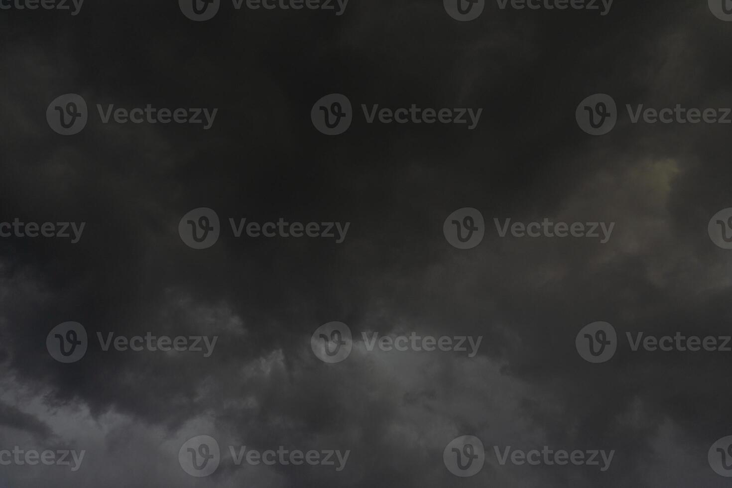 background of dark clouds during the day, with beautiful gray and rainbow colors photo