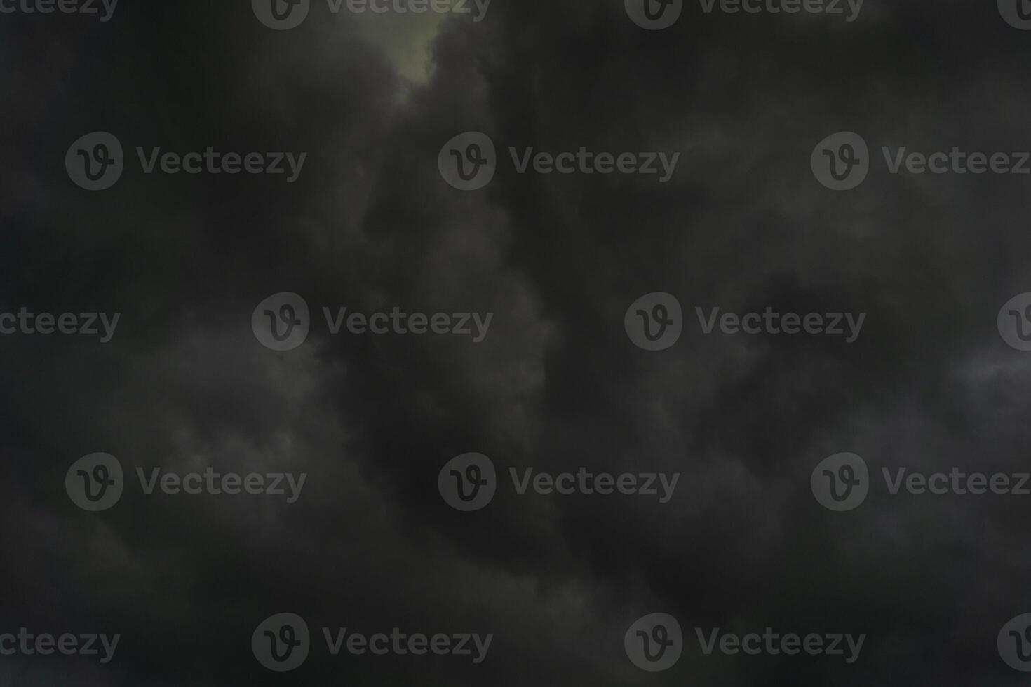 background of dark clouds during the day, with beautiful gray and rainbow colors photo