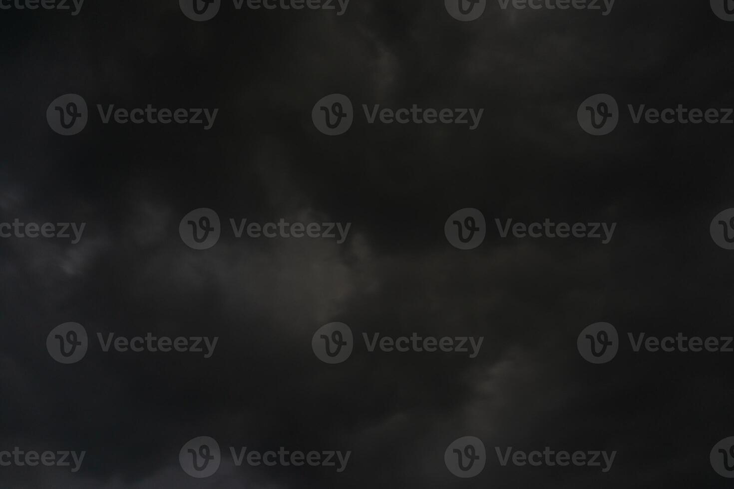 background of dark clouds during the day, with beautiful gray and rainbow colors photo