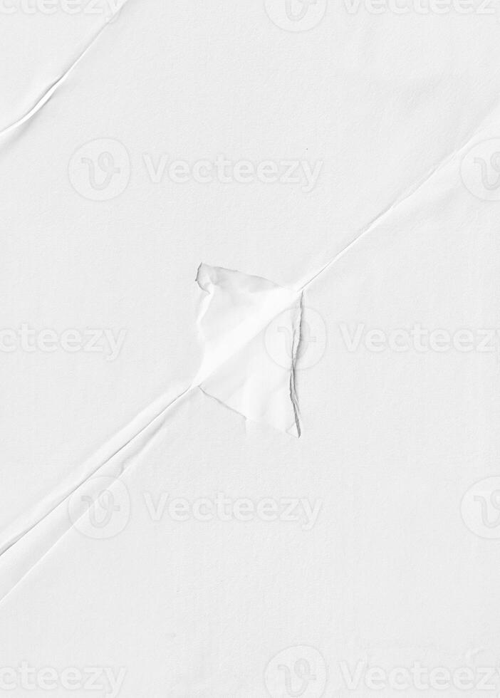 High-resolution white paper texture featuring subtle creases and folds, ideal for backgrounds, design, and overlays. photo