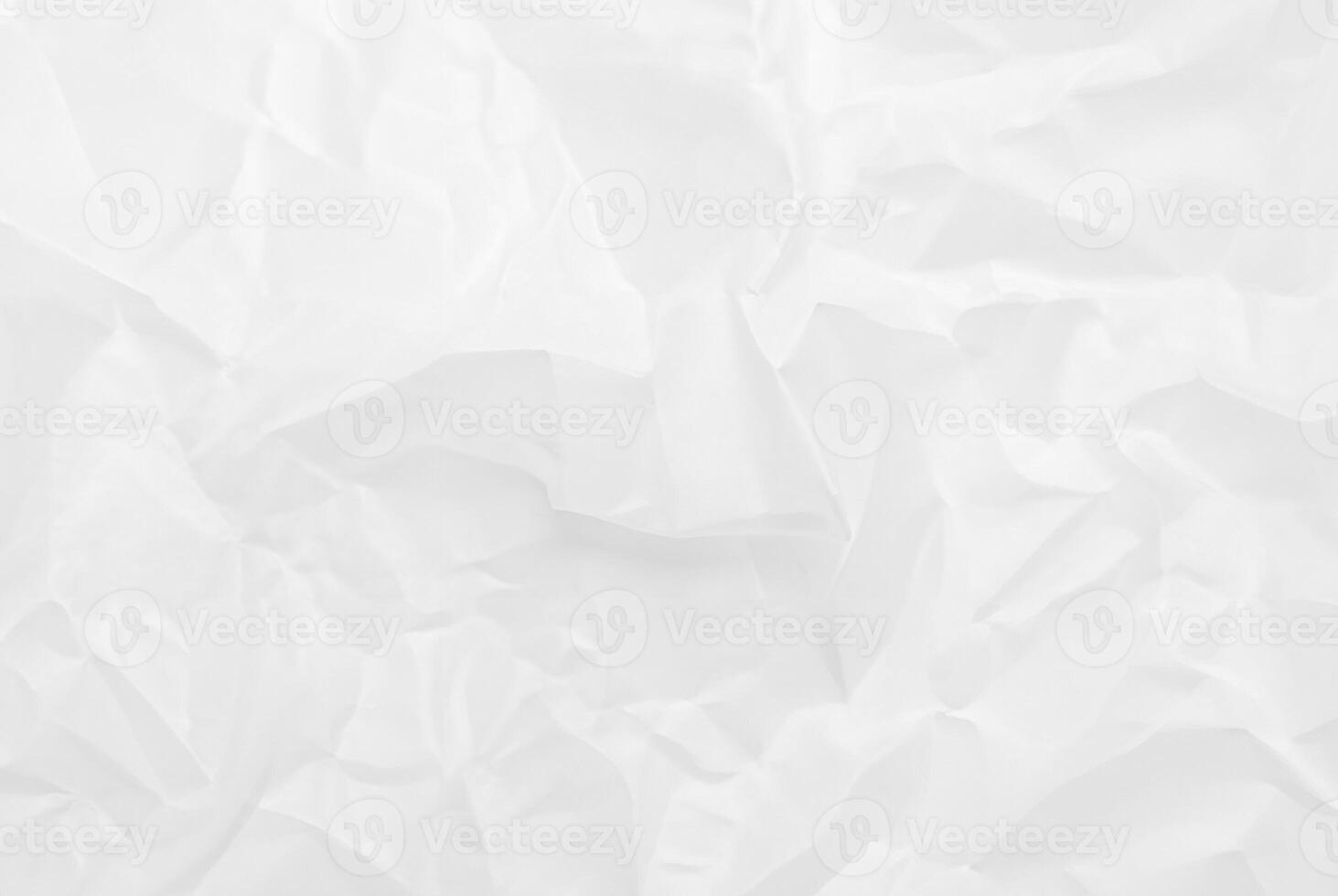 Close-up of crumpled white tissue paper texture, ideal for use in design, backgrounds, and abstract art projects. photo