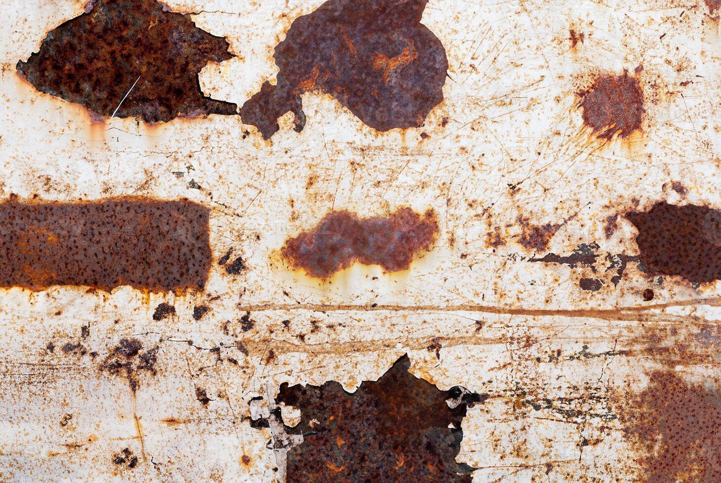 Rusty Grunge Texture with Scratches and Stains on Weathered Surface photo