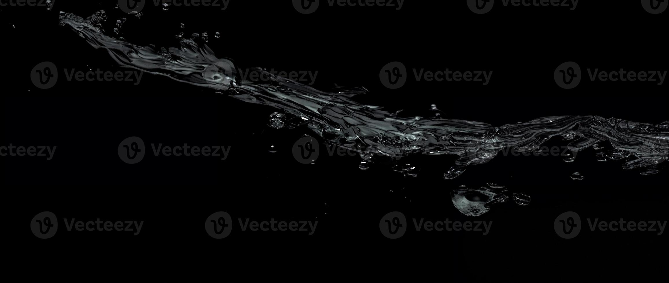 Seamless Transition, Underwater and Above Water Boundary on Dark Background photo