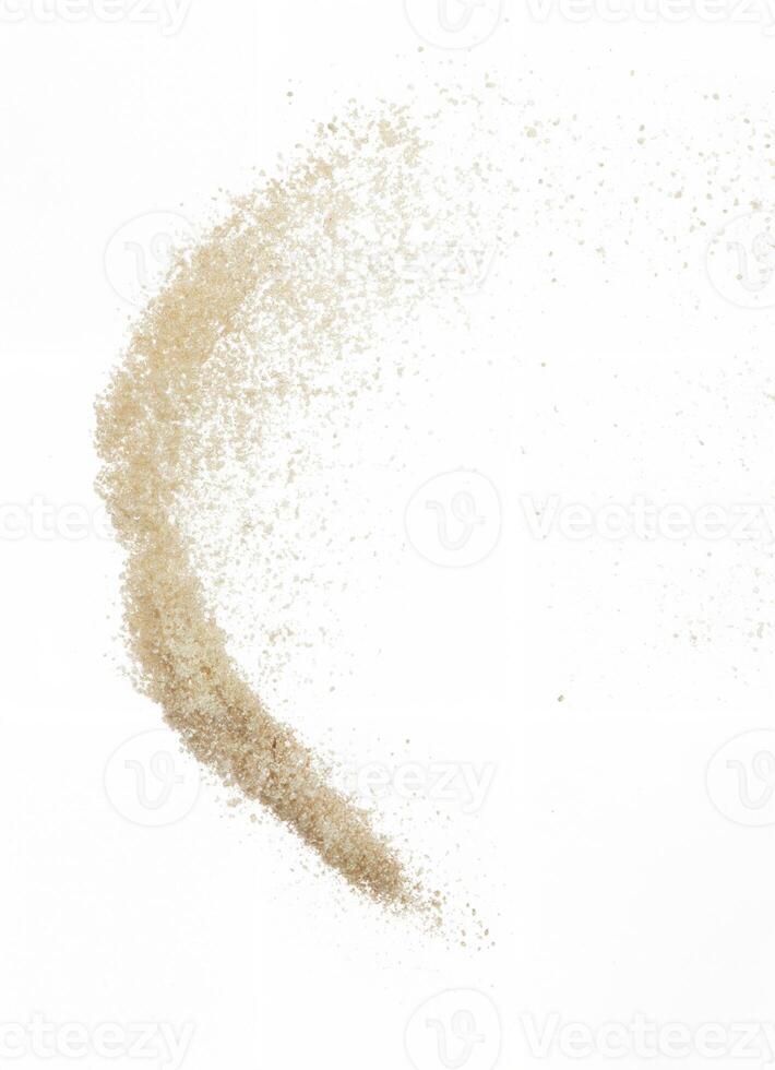 Brown Sugar Explosion in Mid-Air, Granulated Sugarcane Particles Suspended in a Dynamic Freeze-Frame Against a White Background photo